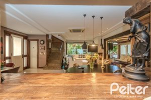 Casa em Condomínio à venda com 380m², 4 dormitórios, 2 suítes, 3 vagas, no bairro Tristeza em PORTO ALEGRE