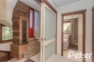 Casa em Condomínio à venda com 380m², 4 dormitórios, 2 suítes, 3 vagas, no bairro Tristeza em PORTO ALEGRE