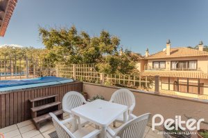 Casa em Condomínio à venda com 380m², 4 dormitórios, 2 suítes, 3 vagas, no bairro Tristeza em PORTO ALEGRE