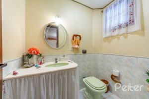 Casa em Condomínio à venda com 178m², 4 dormitórios, 2 suítes, 4 vagas, no bairro Ipanema em Porto Alegre