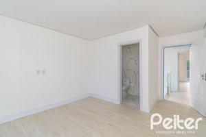 Casa em Condomínio à venda com 292m², 4 dormitórios, 4 suítes, 4 vagas, no bairro Alphaville em PORTO ALEGRE