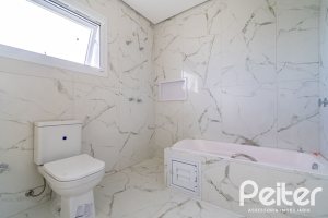 Casa em Condomínio à venda com 292m², 4 dormitórios, 4 suítes, 4 vagas, no bairro Alphaville em PORTO ALEGRE