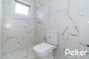 Casa em Condomínio à venda com 292m², 4 dormitórios, 4 suítes, 4 vagas, no bairro Alphaville em PORTO ALEGRE