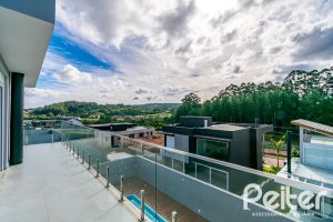 Casa em Condomínio à venda com 292m², 4 dormitórios, 4 suítes, 4 vagas, no bairro Alphaville em PORTO ALEGRE