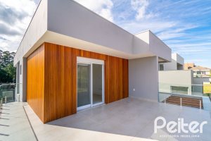 Casa em Condomínio à venda com 292m², 4 dormitórios, 4 suítes, 4 vagas, no bairro Alphaville em PORTO ALEGRE