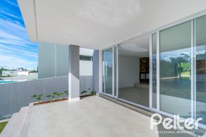 Casa em Condomínio à venda com 292m², 4 dormitórios, 4 suítes, 4 vagas, no bairro Alphaville em PORTO ALEGRE