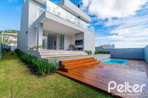 Casa em Condomínio à venda com 292m², 4 dormitórios, 4 suítes, 4 vagas, no bairro Alphaville em PORTO ALEGRE