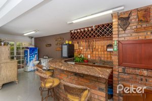 Casa em Condomínio à venda com 290m², 4 dormitórios, 2 suítes, 2 vagas, no bairro Ipanema em Porto Alegre
