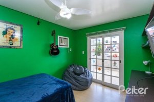 Casa em Condomínio à venda com 290m², 4 dormitórios, 2 suítes, 2 vagas, no bairro Ipanema em Porto Alegre