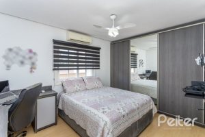 Casa em Condomínio à venda com 290m², 4 dormitórios, 2 suítes, 2 vagas, no bairro Ipanema em Porto Alegre