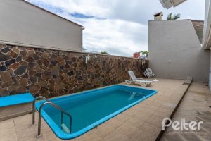 Casa em Condomínio à venda com 290m², 4 dormitórios, 2 suítes, 2 vagas, no bairro Ipanema em Porto Alegre