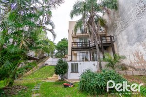 Casa à venda com 262m², 3 dormitórios, 1 suíte, 2 vagas, no bairro Jardim Isabel em Porto Alegre