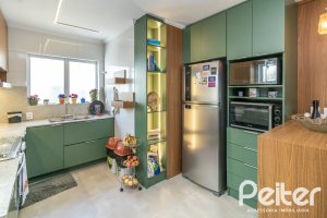 Casa à venda com 380m², 4 dormitórios, 4 suítes, 3 vagas, no bairro Vila Assunção em Porto Alegre