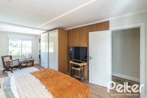 Casa à venda com 380m², 4 dormitórios, 4 suítes, 3 vagas, no bairro Vila Assunção em Porto Alegre