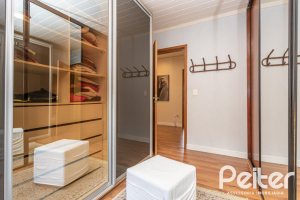 Casa em Condomínio à venda com 186m², 3 dormitórios, 1 suíte, 2 vagas, no bairro Sétimo Céu em Porto Alegre