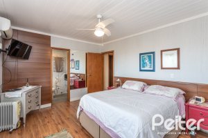 Casa em Condomínio à venda com 186m², 3 dormitórios, 1 suíte, 2 vagas, no bairro Sétimo Céu em Porto Alegre