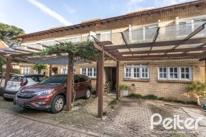 Casa em Condomínio à venda com 186m², 3 dormitórios, 1 suíte, 2 vagas, no bairro Sétimo Céu em Porto Alegre