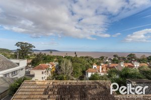 Casa em Condomínio à venda com 186m², 3 dormitórios, 1 suíte, 2 vagas, no bairro Sétimo Céu em Porto Alegre