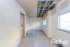 Casa em Condomínio à venda com 237m², 4 dormitórios, 4 suítes, 3 vagas, no bairro Vila Assunção em Porto Alegre