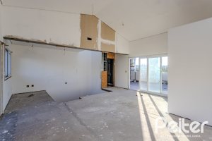 Casa em Condomínio à venda com 237m², 4 dormitórios, 4 suítes, 3 vagas, no bairro Vila Assunção em Porto Alegre