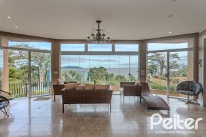 Casa à venda com 450m², 4 dormitórios, 3 suítes, 5 vagas, no bairro Vila Conceição em Porto Alegre