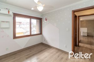 Casa em Condomínio à venda com 176m², 3 dormitórios, 1 suíte, 2 vagas, no bairro Ipanema em Porto Alegre