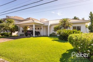 Casa em Condomínio à venda com 253m², 3 dormitórios, 1 suíte, 2 vagas, no bairro Terra Ville em PORTO ALEGRE