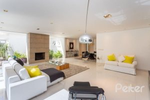 Casa em Condomínio à venda com 253m², 3 dormitórios, 1 suíte, 2 vagas, no bairro Terra Ville em PORTO ALEGRE