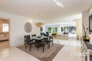 Casa em Condomínio à venda com 253m², 3 dormitórios, 1 suíte, 2 vagas, no bairro Terra Ville em PORTO ALEGRE