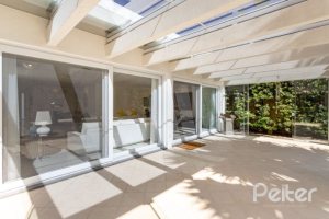 Casa em Condomínio à venda com 253m², 3 dormitórios, 1 suíte, 2 vagas, no bairro Terra Ville em PORTO ALEGRE