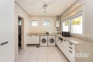 Casa em Condomínio à venda com 253m², 3 dormitórios, 1 suíte, 2 vagas, no bairro Terra Ville em PORTO ALEGRE