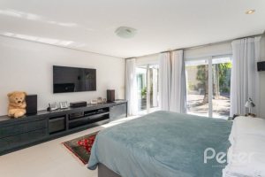 Casa em Condomínio à venda com 253m², 3 dormitórios, 1 suíte, 2 vagas, no bairro Terra Ville em PORTO ALEGRE