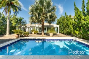 Casa em Condomínio à venda com 253m², 3 dormitórios, 1 suíte, 2 vagas, no bairro Terra Ville em PORTO ALEGRE