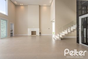 Casa em Condomínio à venda com 387m², 4 dormitórios, 4 suítes, 5 vagas, no bairro Alphaville em PORTO ALEGRE