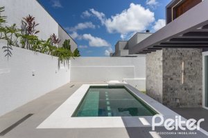 Casa em Condomínio à venda com 387m², 4 dormitórios, 4 suítes, 5 vagas, no bairro Alphaville em PORTO ALEGRE