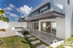 Casa em Condomínio à venda com 387m², 4 dormitórios, 4 suítes, 5 vagas, no bairro Alphaville em PORTO ALEGRE