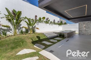 Casa em Condomínio à venda com 387m², 4 dormitórios, 4 suítes, 5 vagas, no bairro Alphaville em PORTO ALEGRE