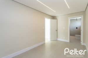 Casa em Condomínio à venda com 387m², 4 dormitórios, 4 suítes, 5 vagas, no bairro Alphaville em PORTO ALEGRE