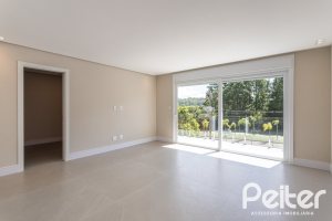 Casa em Condomínio à venda com 387m², 4 dormitórios, 4 suítes, 5 vagas, no bairro Alphaville em PORTO ALEGRE