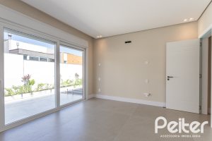 Casa em Condomínio à venda com 387m², 4 dormitórios, 4 suítes, 5 vagas, no bairro Alphaville em PORTO ALEGRE