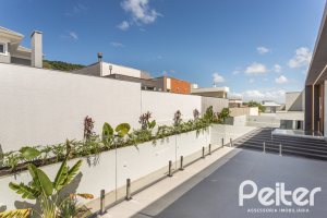 Casa em Condomínio à venda com 387m², 4 dormitórios, 4 suítes, 5 vagas, no bairro Alphaville em PORTO ALEGRE