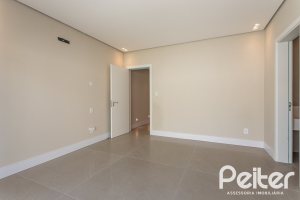 Casa em Condomínio à venda com 387m², 4 dormitórios, 4 suítes, 5 vagas, no bairro Alphaville em PORTO ALEGRE