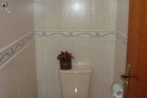 Casa à venda com 150m², 3 dormitórios, 1 suíte, 2 vagas, no bairro Guarujá em Porto Alegre