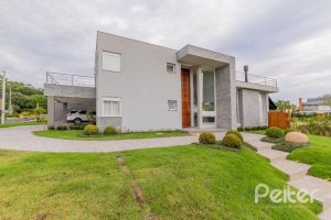 Casa em Condomínio à venda com 291m², 4 dormitórios, 4 suítes, 3 vagas, no bairro Terra Ville em PORTO ALEGRE