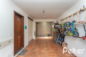 Casa em Condomínio à venda com 143m², 4 dormitórios, 1 suíte, 2 vagas, no bairro Tristeza em Porto Alegre