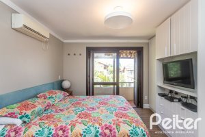 Casa em Condomínio à venda com 143m², 4 dormitórios, 1 suíte, 2 vagas, no bairro Tristeza em Porto Alegre