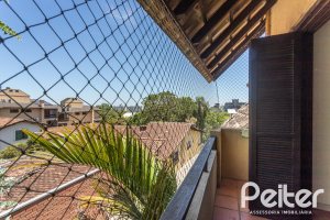 Casa em Condomínio à venda com 143m², 4 dormitórios, 1 suíte, 2 vagas, no bairro Tristeza em Porto Alegre