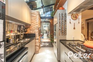 Casa em Condomínio à venda com 143m², 4 dormitórios, 1 suíte, 2 vagas, no bairro Tristeza em Porto Alegre