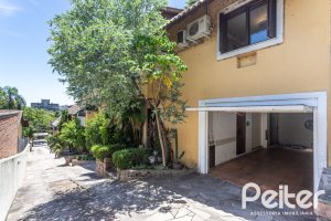 Casa em Condomínio à venda com 143m², 4 dormitórios, 1 suíte, 2 vagas, no bairro Tristeza em Porto Alegre