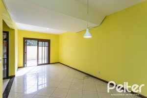 Casa em Condomínio à venda com 179m², 3 dormitórios, 1 suíte, 2 vagas, no bairro Tristeza em Porto Alegre
